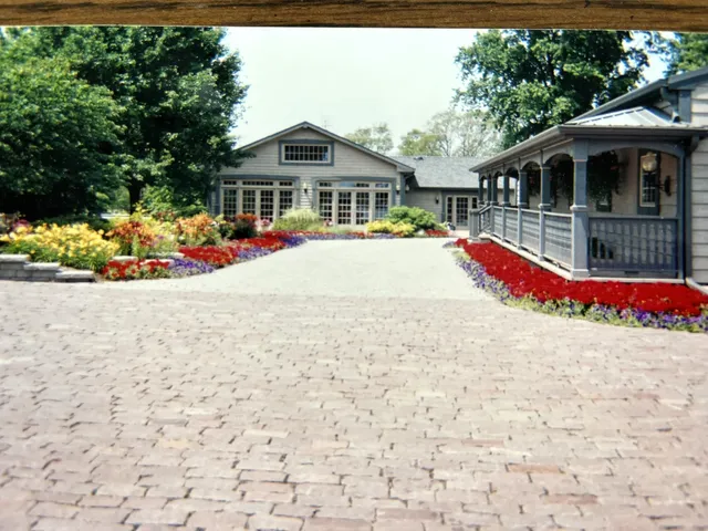 a view of large house with a yard