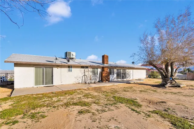 a view of a house with a big yard