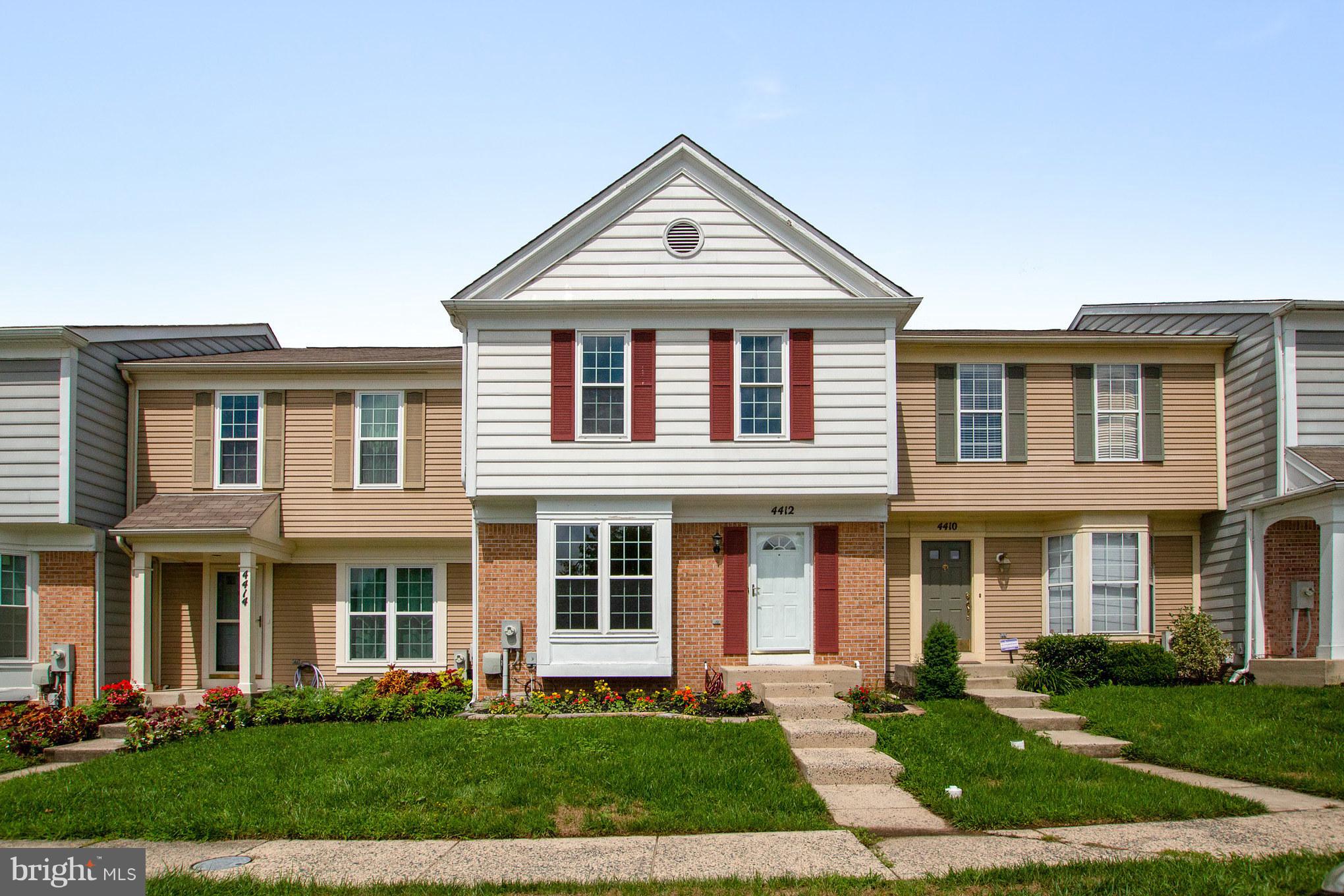 Brick and siding w/new landscaping