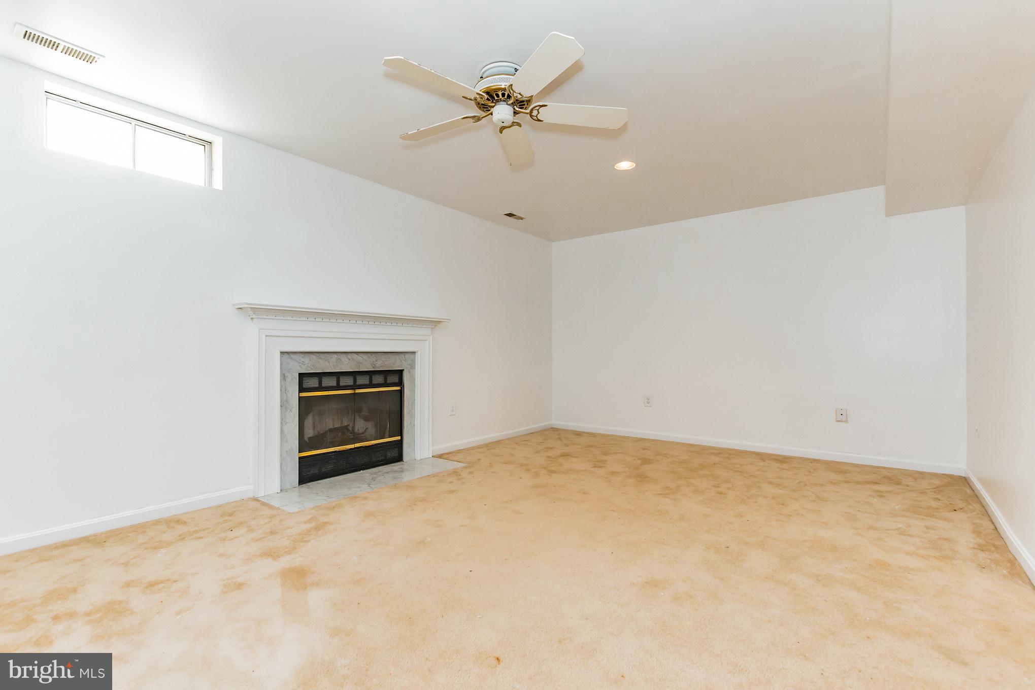 4412 Cole Farm Road Nottingham, MD 21236 - Photo 23 of 26 Spacious basement w/FP and half bath