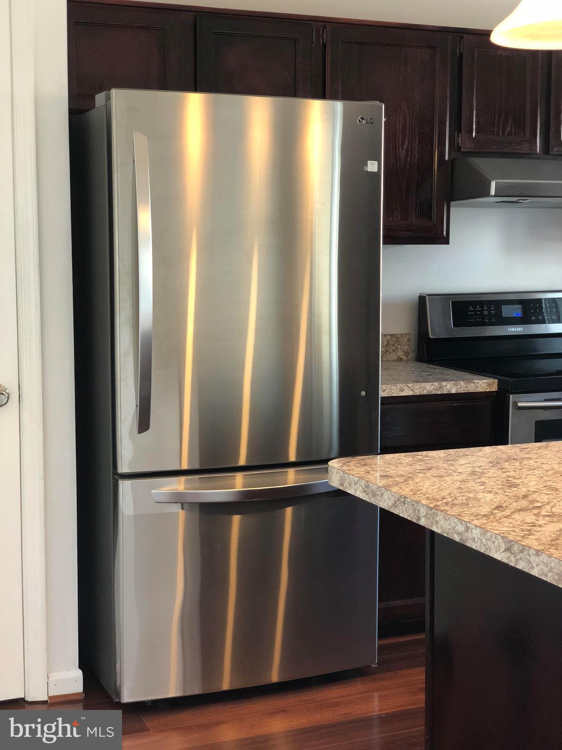 4412 Cole Farm Road Nottingham, MD 21236 - Photo 4 of 26 Shiny new fridge