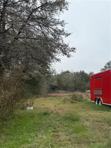 a view of outdoor space and yard