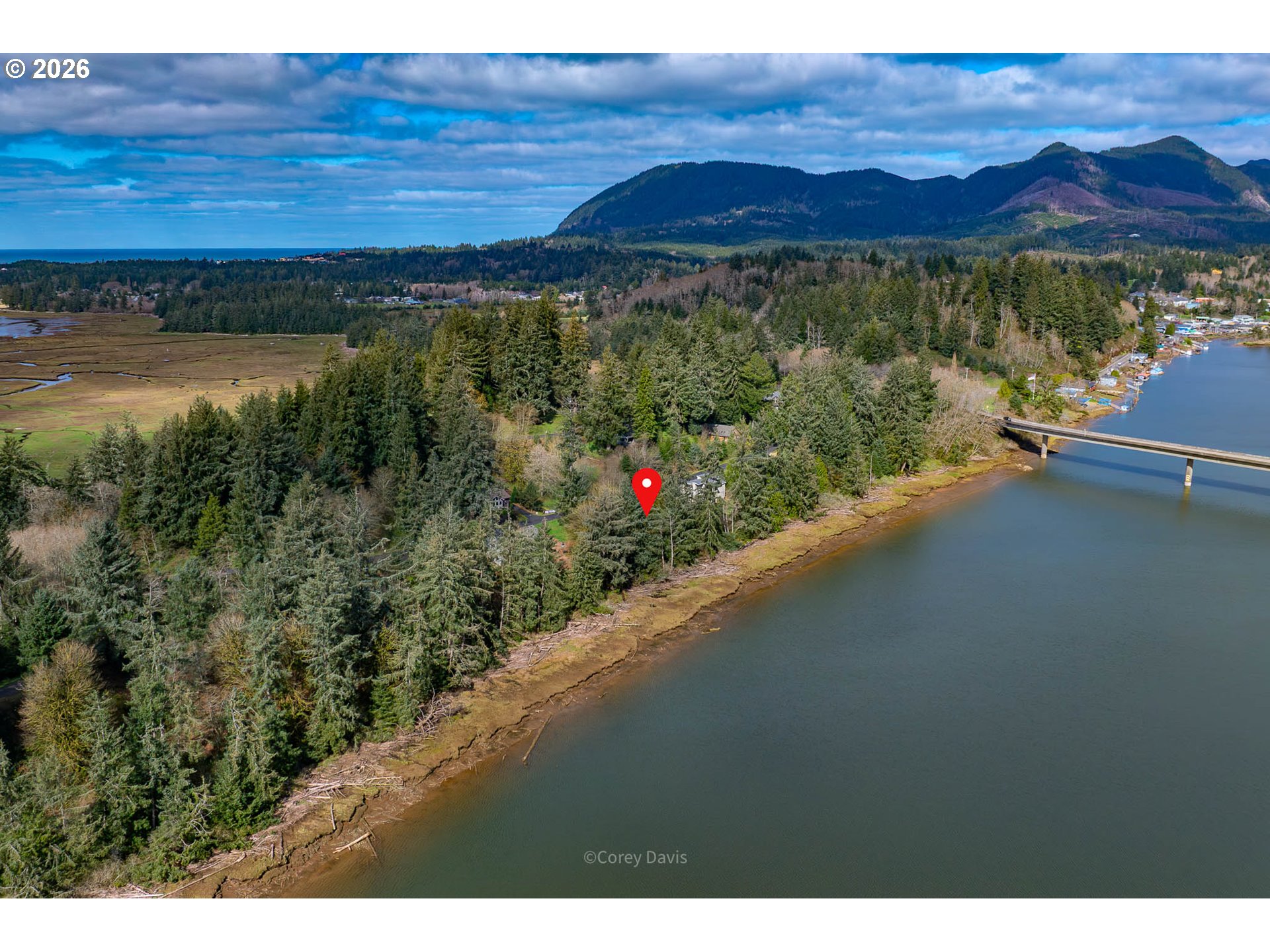 Riverway Drive, Unit 14 Nehalem, OR 97131 - Photo 3 of 19 a view of a city from a yard