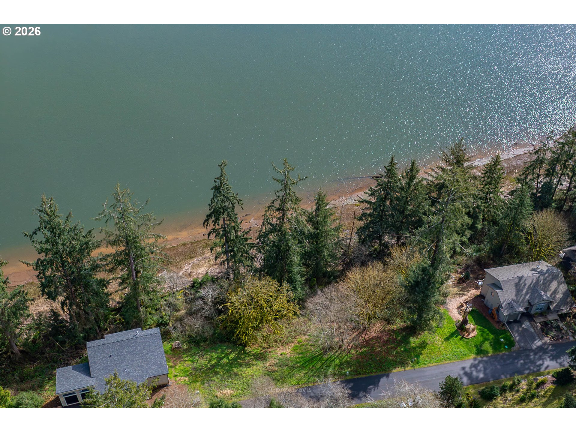Riverway Drive, Unit 14 Nehalem, OR 97131 - Photo 5 of 19 a view of a yard in front of a house