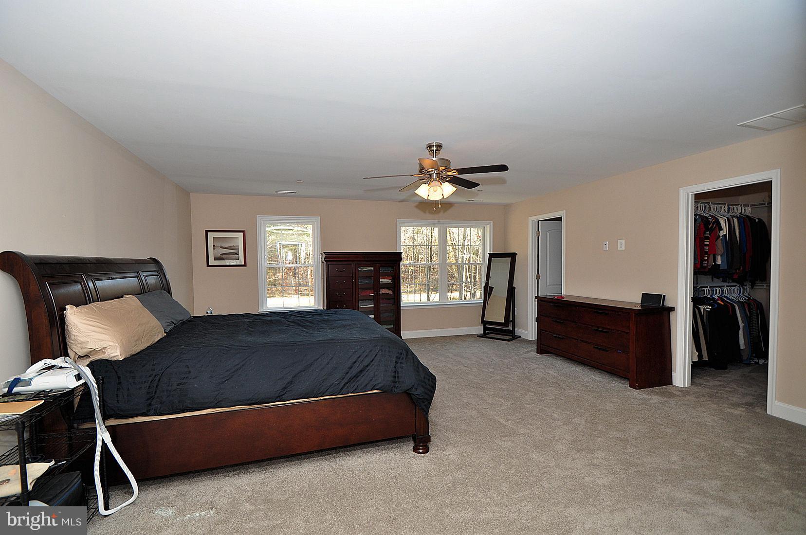 7720 Paradise Beach Road Pasadena, MD 21122 - Photo 13 of 23 20x18 master bedroom with double closets