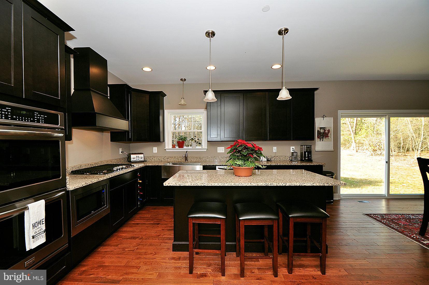 7720 Paradise Beach Road Pasadena, MD 21122 - Photo 8 of 23 Large island for entertaining and eating