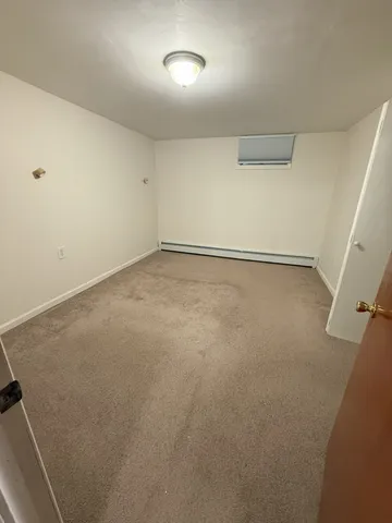 a kitchen with stainless steel appliances a refrigerator and microwave