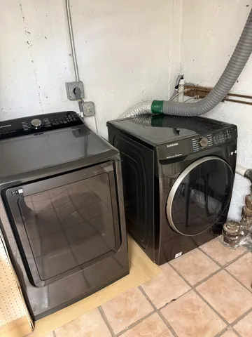 a view of balcony with two chairs