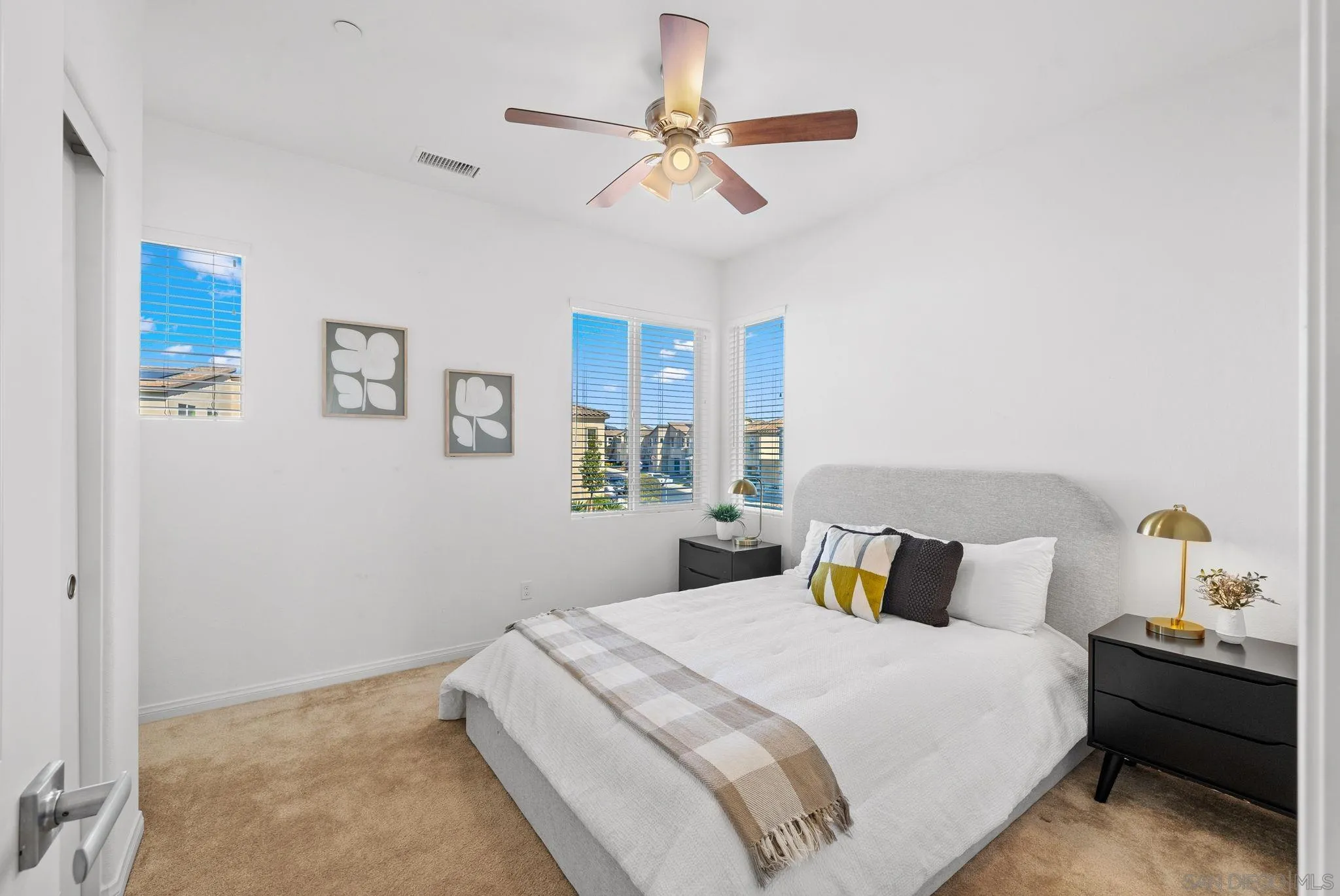 8749 Scrub Oak Street Santee, CA 92071 - Photo 18 of 43 a bedroom with a bed and window