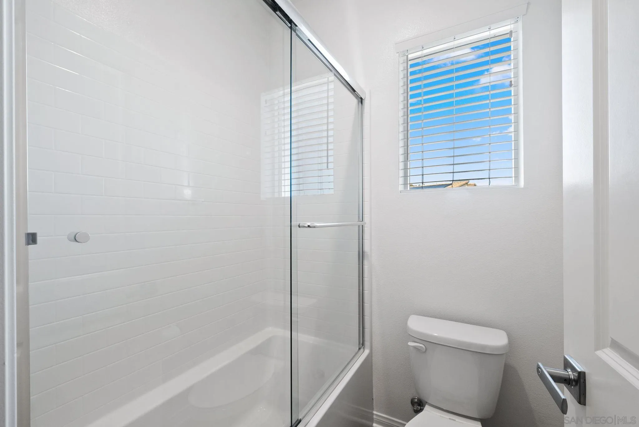 8749 Scrub Oak Street Santee, CA 92071 - Photo 20 of 43 a bathroom with a toilet and a shower