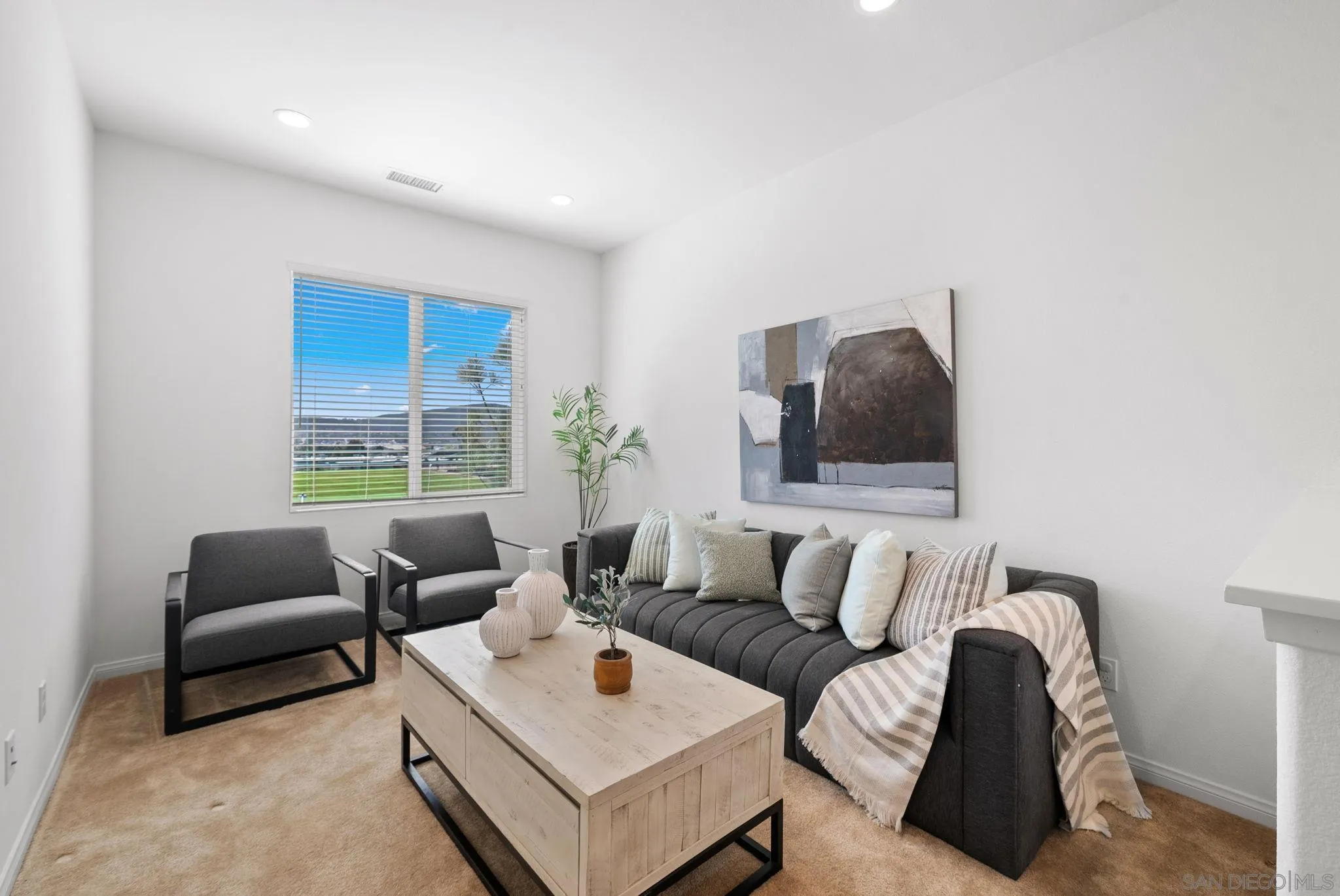 8749 Scrub Oak Street Santee, CA 92071 - Photo 21 of 43 a living room with furniture and a window