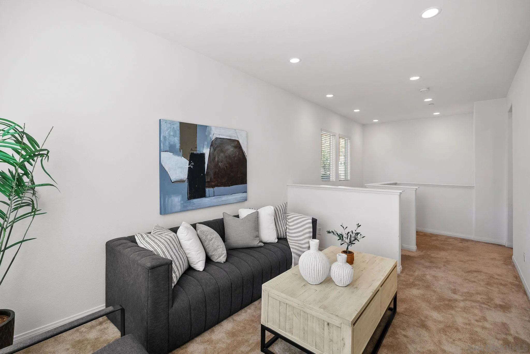8749 Scrub Oak Street Santee, CA 92071 - Photo 22 of 43 a living room with furniture and a potted plant