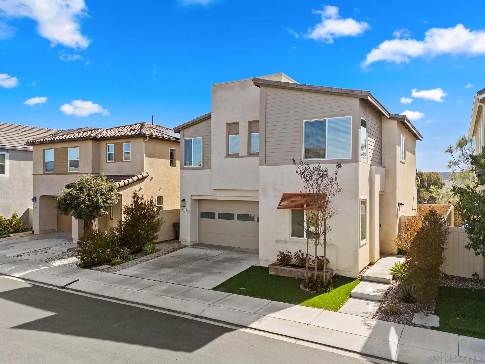 8749 Scrub Oak Street Santee, CA 92071 - Photo 38 of 43 a front view of a house with garden