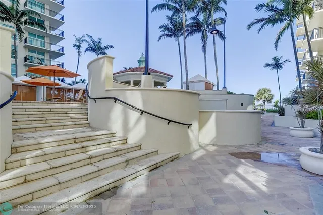 a view of a table and chairs in the patio