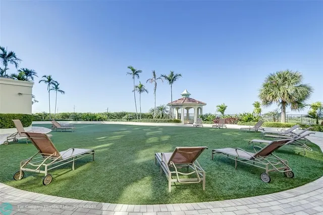 a view of a building with a garden