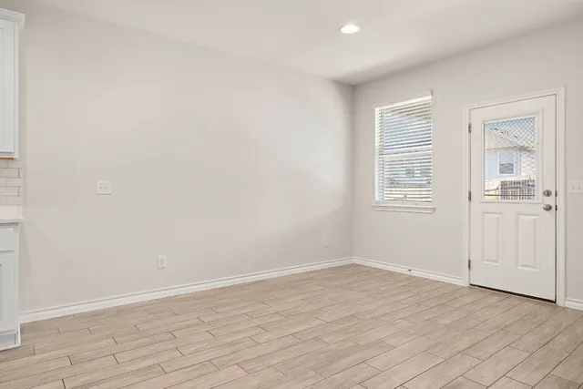 an empty room with windows