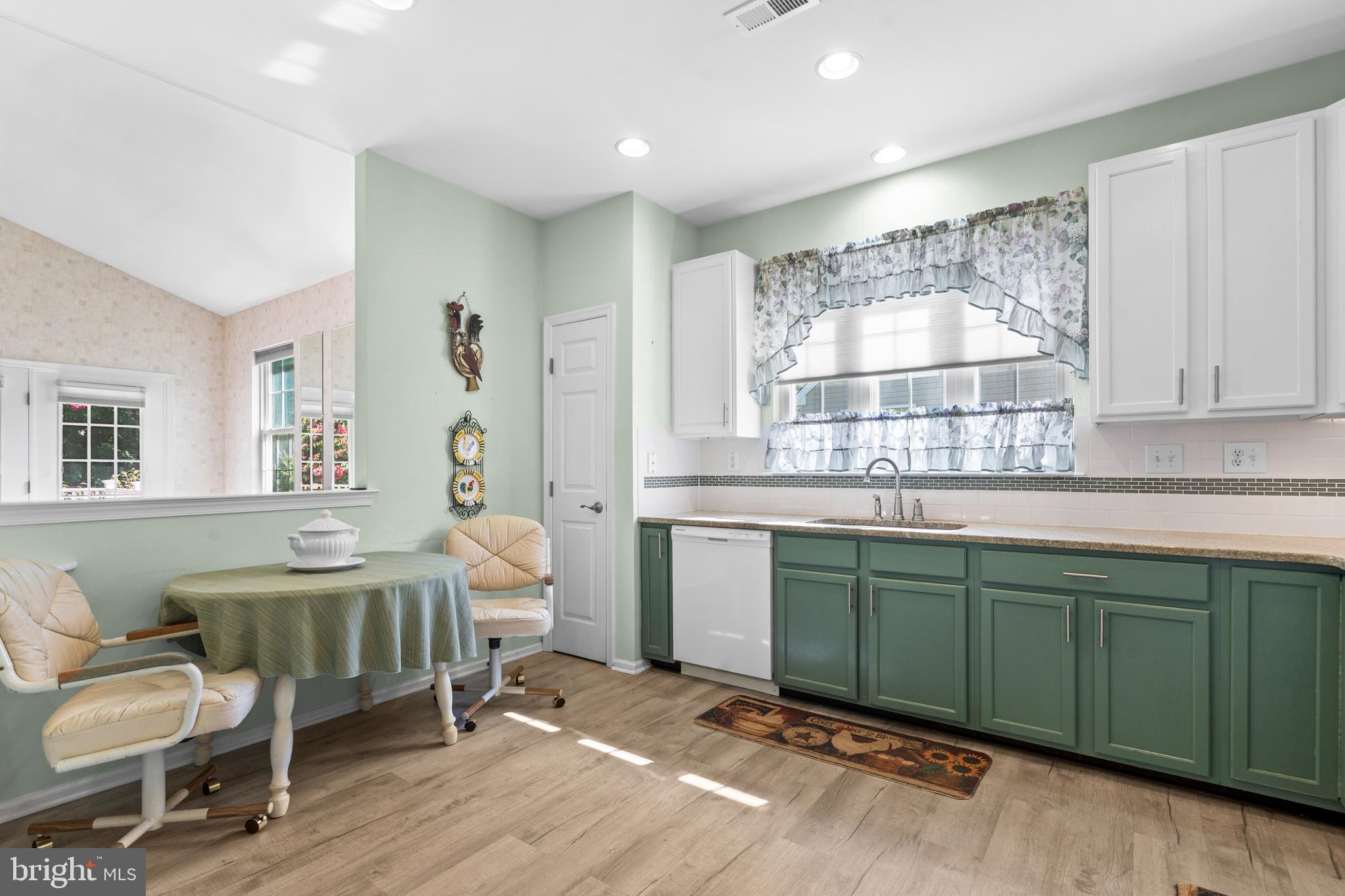 24 Tupelo Lane Langhorne, PA 19047 - Photo 13 of 37 a living room with a sink and a window