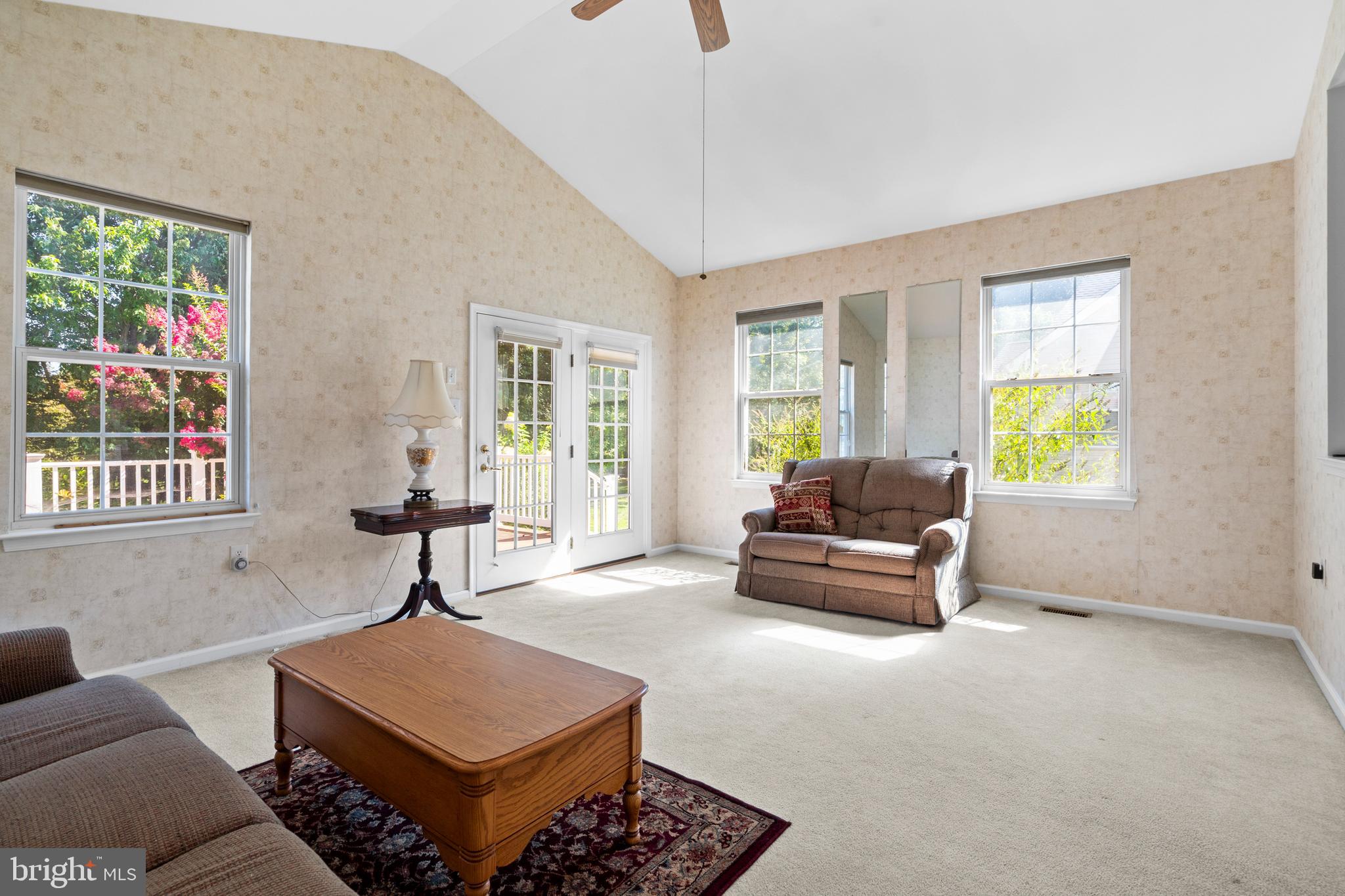 24 Tupelo Lane Langhorne, PA 19047 - Photo 16 of 37 a living room with furniture and a window