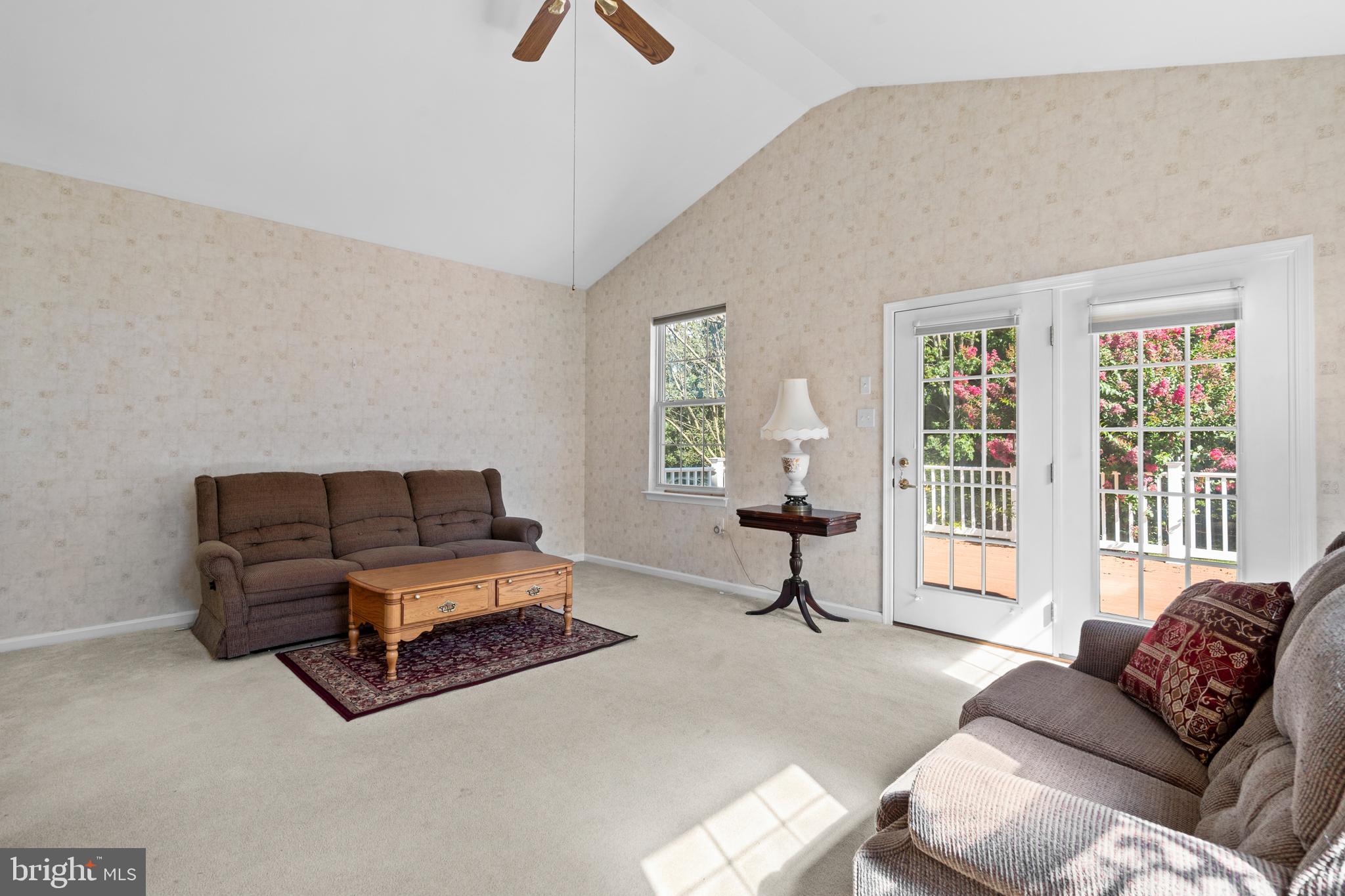 24 Tupelo Lane Langhorne, PA 19047 - Photo 17 of 37 a living room with furniture and a window