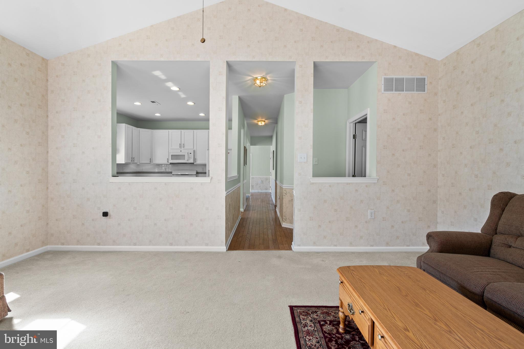 24 Tupelo Lane Langhorne, PA 19047 - Photo 18 of 37 a living room with furniture and a fireplace