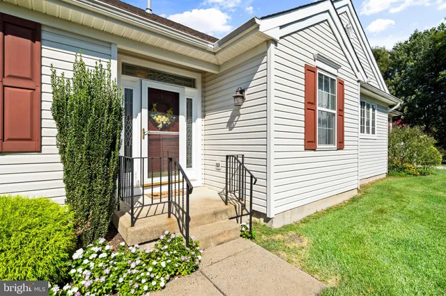 a view of a room with white walls