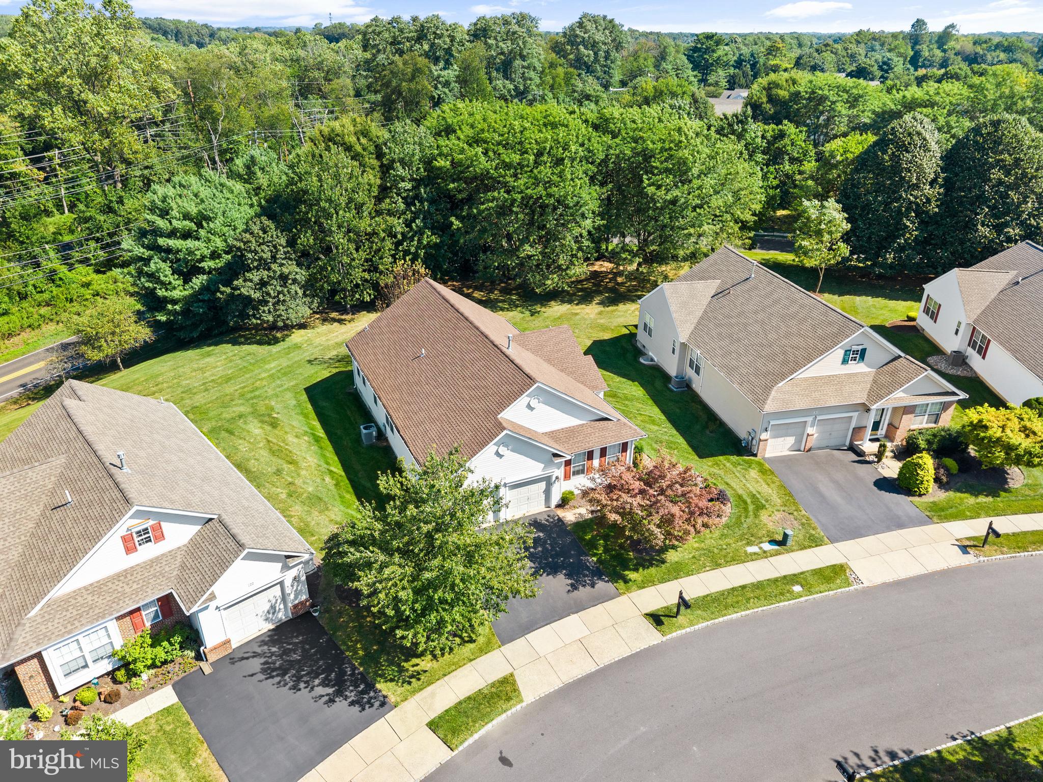 24 Tupelo Lane Langhorne, PA 19047 - Photo 33 of 37 an aerial view of a house with a garden and mountain view in back