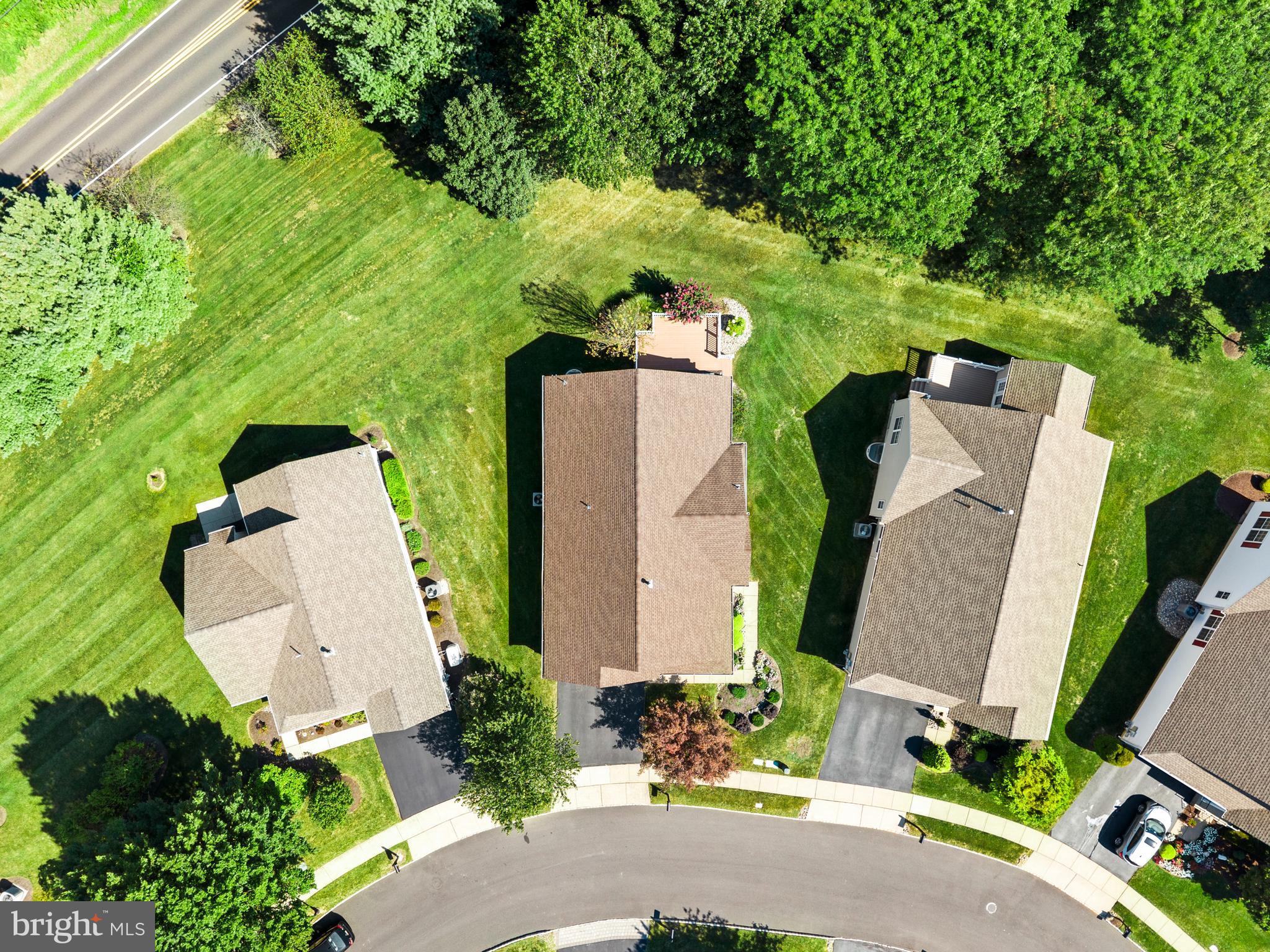24 Tupelo Lane Langhorne, PA 19047 - Photo 36 of 37 an aerial view of a house with outdoor space and trees all around