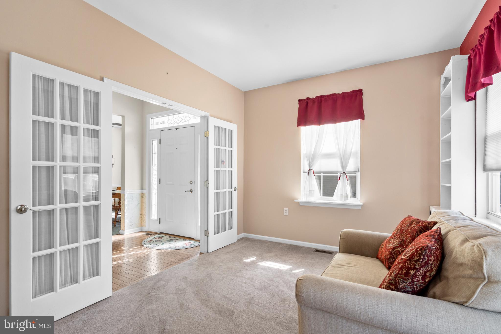24 Tupelo Lane Langhorne, PA 19047 - Photo 6 of 37 a living room with furniture and a window