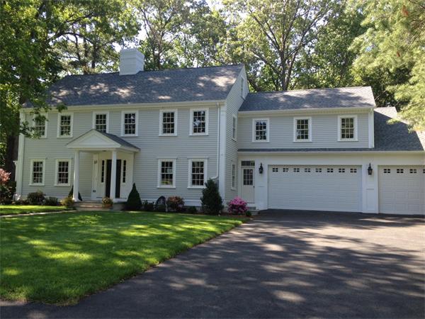 55 Fox Hill Road Wellesley, MA 02481 - Photo 1 of 10 a front view of a house with a yard