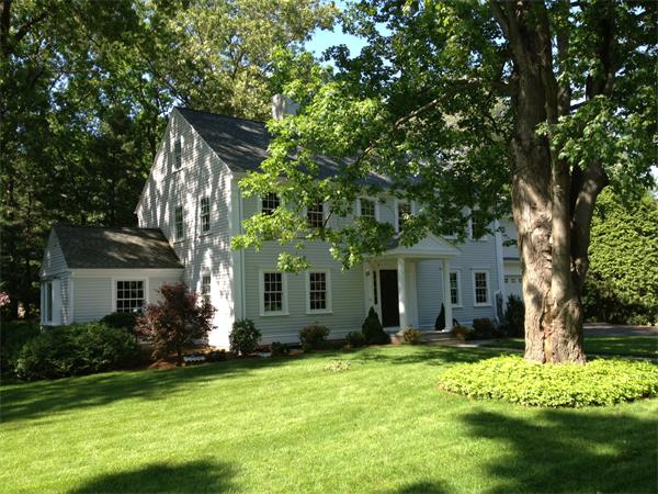55 Fox Hill Road Wellesley, MA 02481 - Photo 2 of 10 a front view of house with yard and green space