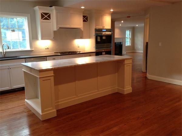 55 Fox Hill Road Wellesley, MA 02481 - Photo 5 of 10 a kitchen with kitchen island granite countertop a stove and a sink