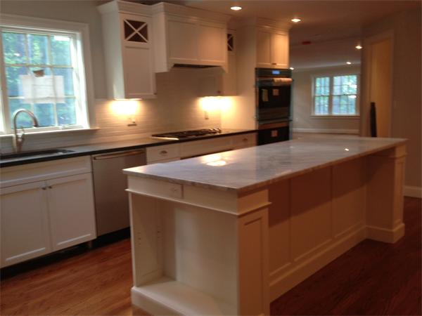 55 Fox Hill Road Wellesley, MA 02481 - Photo 6 of 10 a kitchen with kitchen island a counter top space a sink and appliances