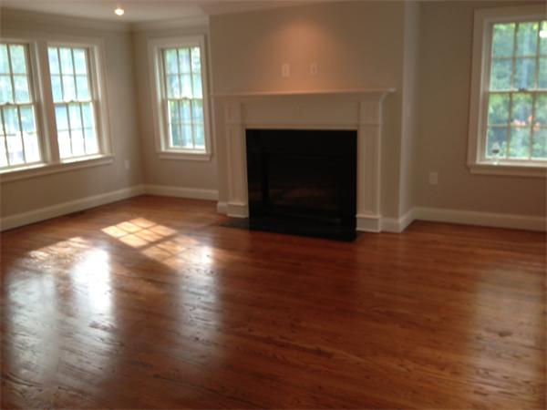 55 Fox Hill Road Wellesley, MA 02481 - Photo 8 of 10 an empty room with windows and fireplace