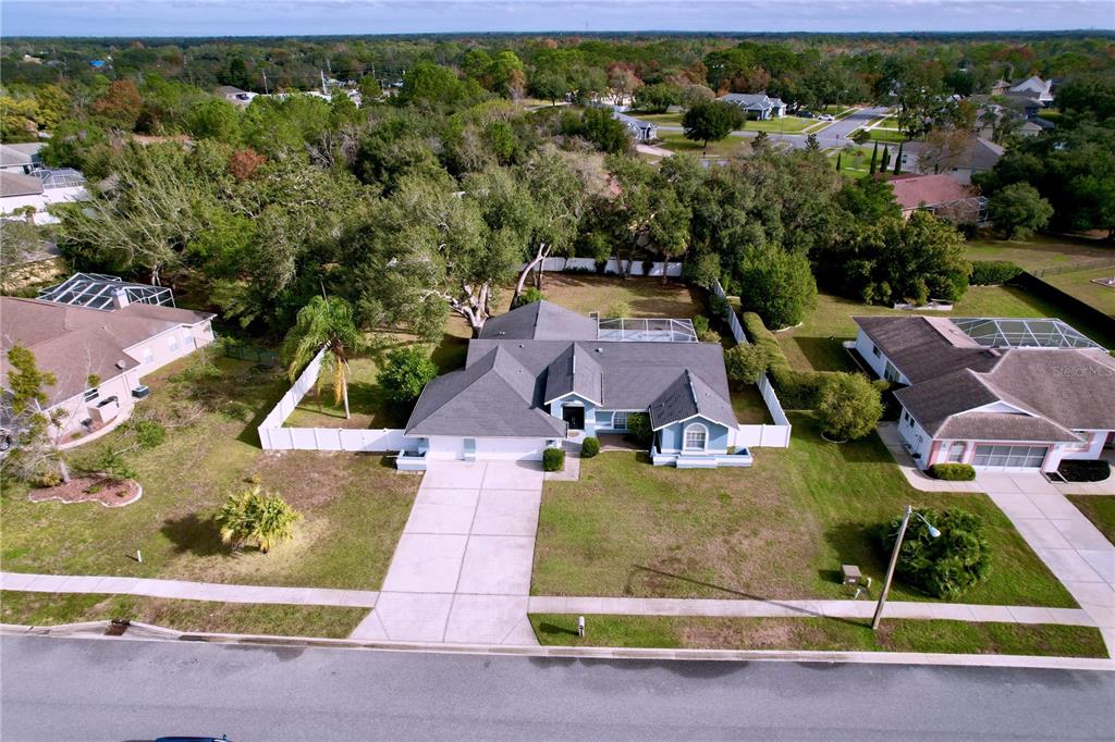 18812 Bascomb Lane Hudson, FL 34667 - Photo 55 of 57 an aerial view of residential houses with outdoor space