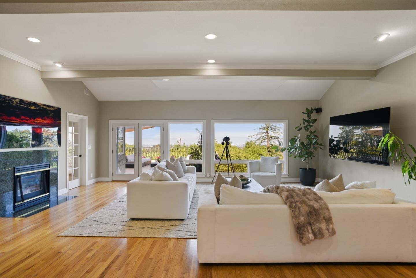 18782 Withey Road Monte Sereno, CA 95030 - Photo 12 of 39 a living room with fireplace furniture and a flat screen tv