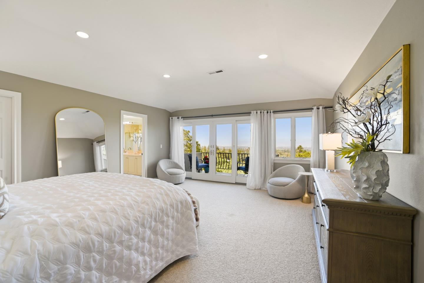 18782 Withey Road Monte Sereno, CA 95030 - Photo 17 of 39 a spacious bedroom with a large bed and a large window