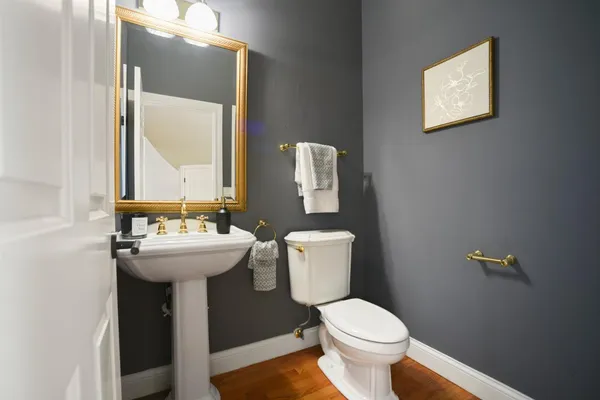 a bathroom with a sink and mirror