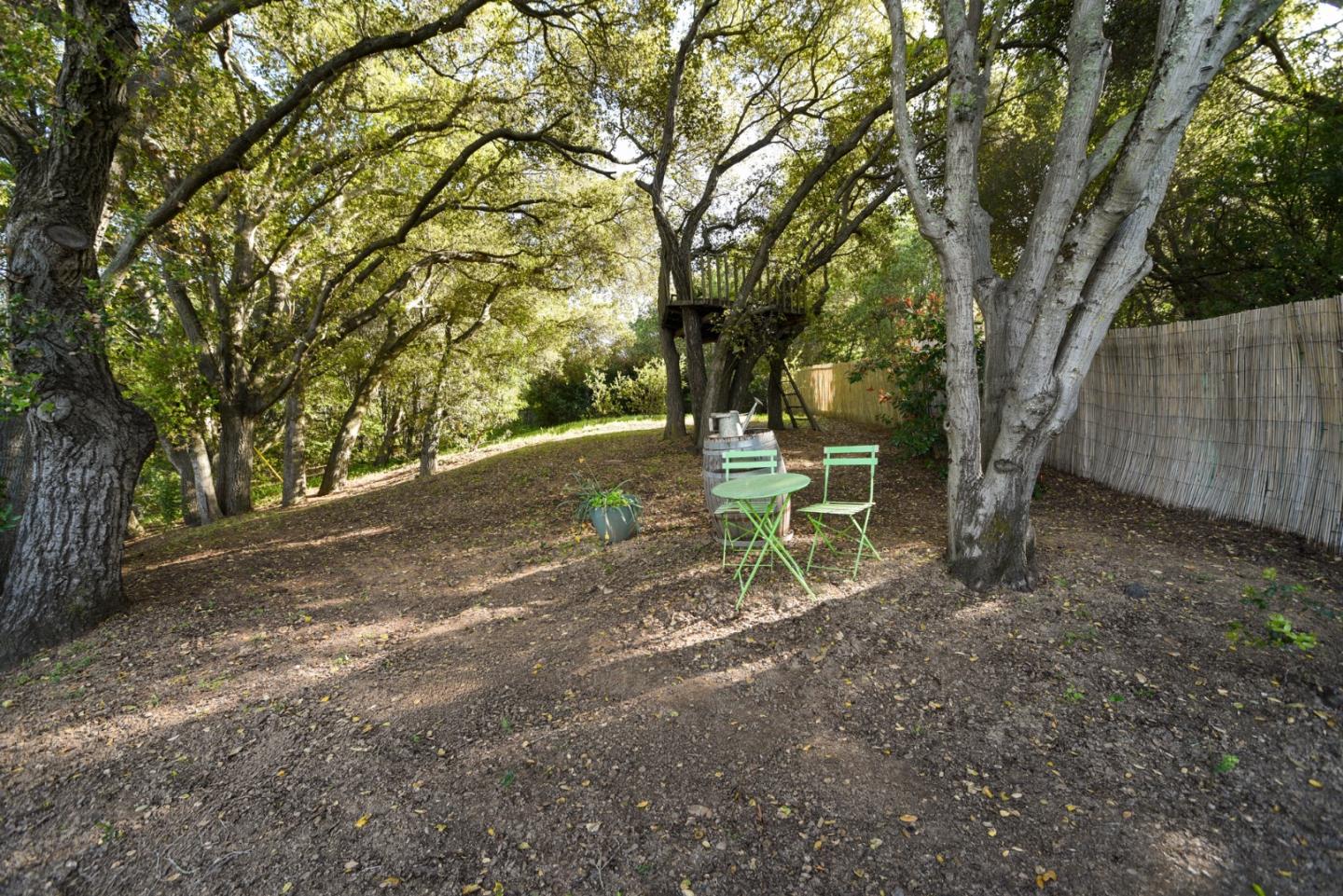 18782 Withey Road Monte Sereno, CA 95030 - Photo 31 of 39 a backyard of a house with table and chairs