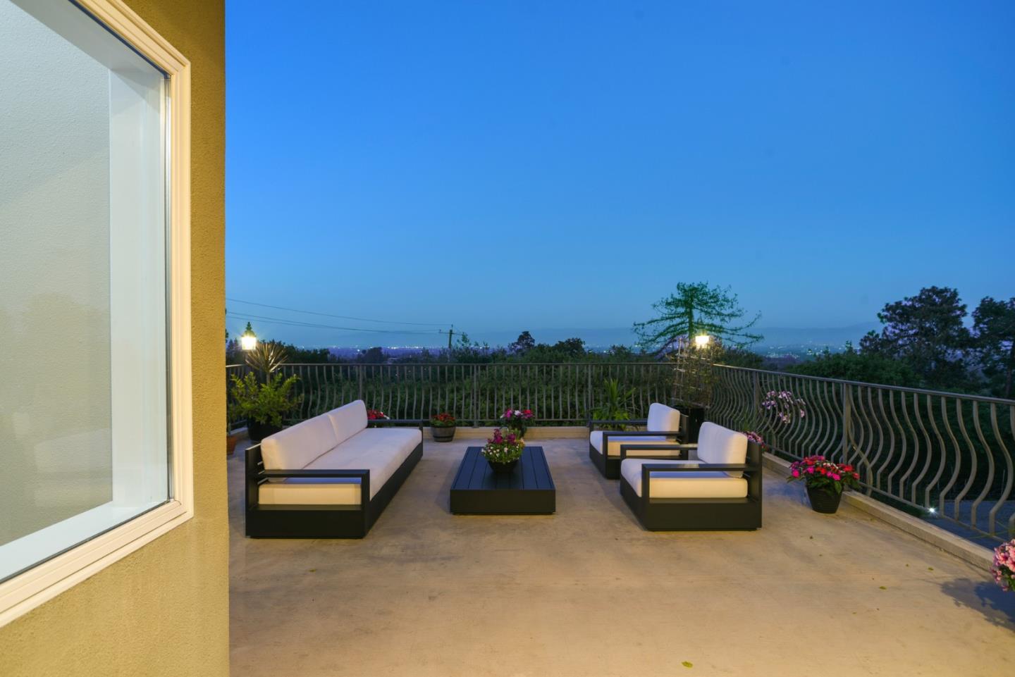 18782 Withey Road Monte Sereno, CA 95030 - Photo 7 of 39 a roof deck with couches and city view