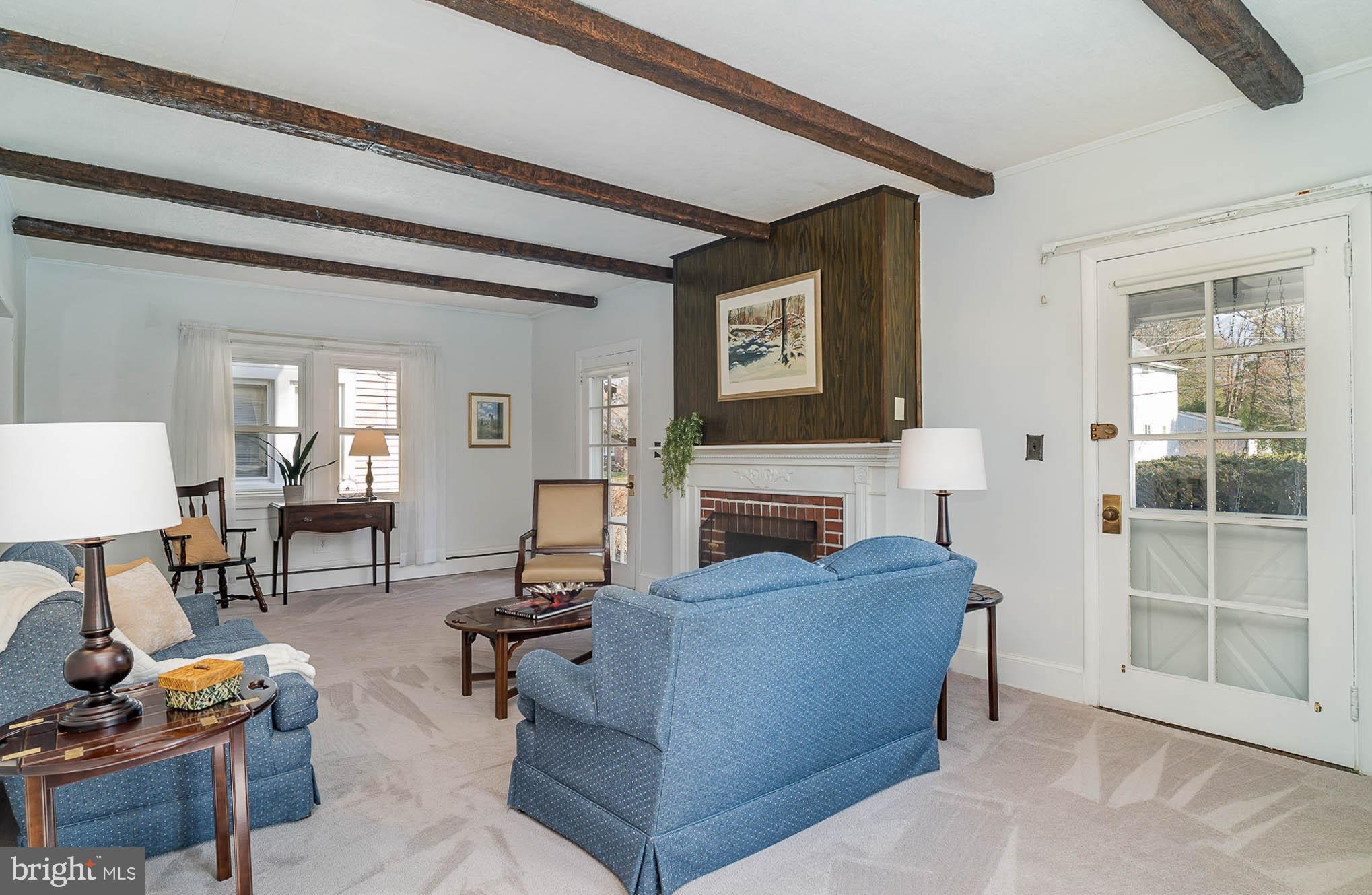 35 West 4th Avenue Lititz, PA 17543 - Photo 7 of 55 a living room with furniture a fireplace and a table