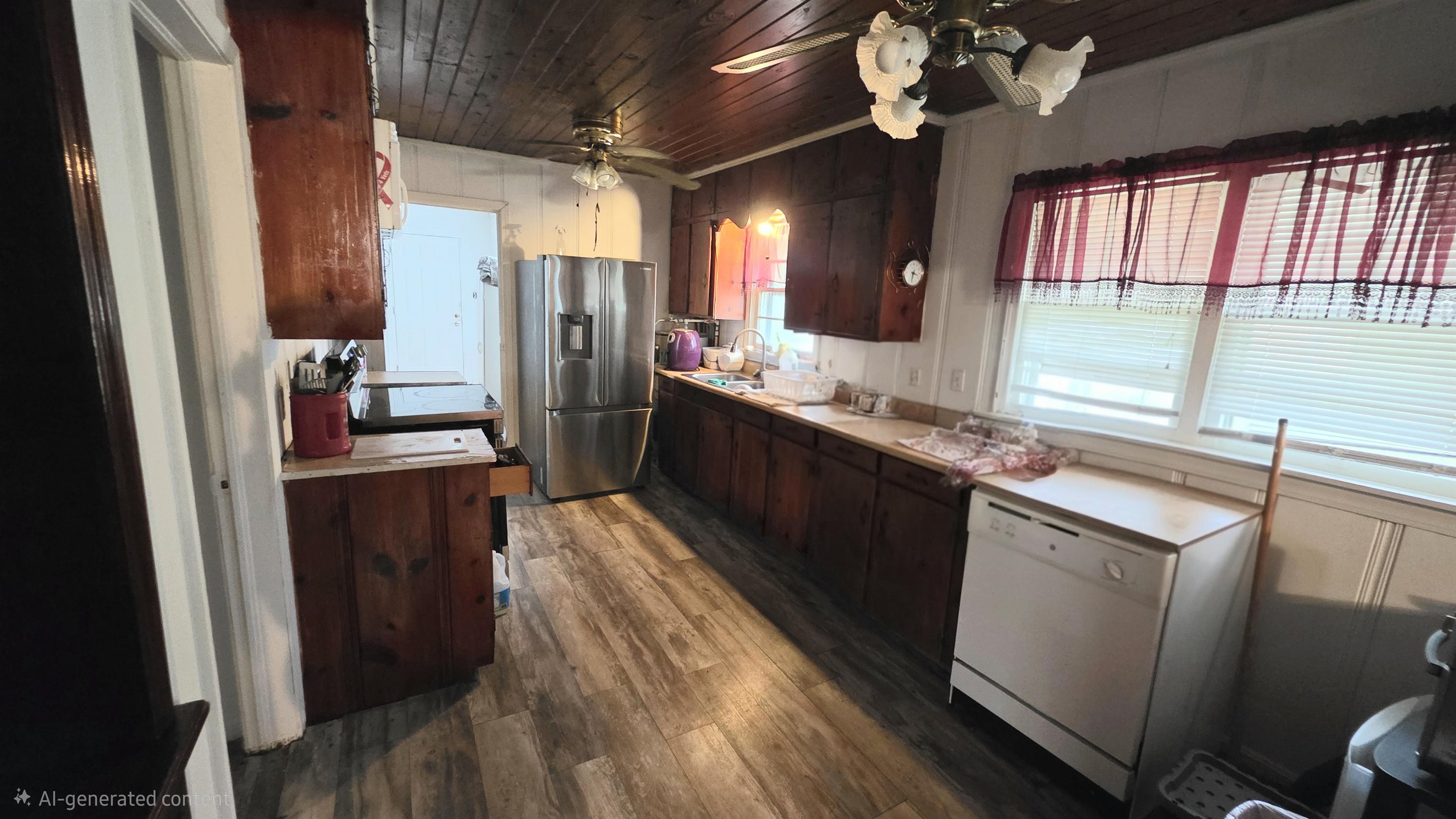 85 Baker Street Savannah, TN 38372 - Photo 2 of 5 a kitchen with a sink appliances and cabinets