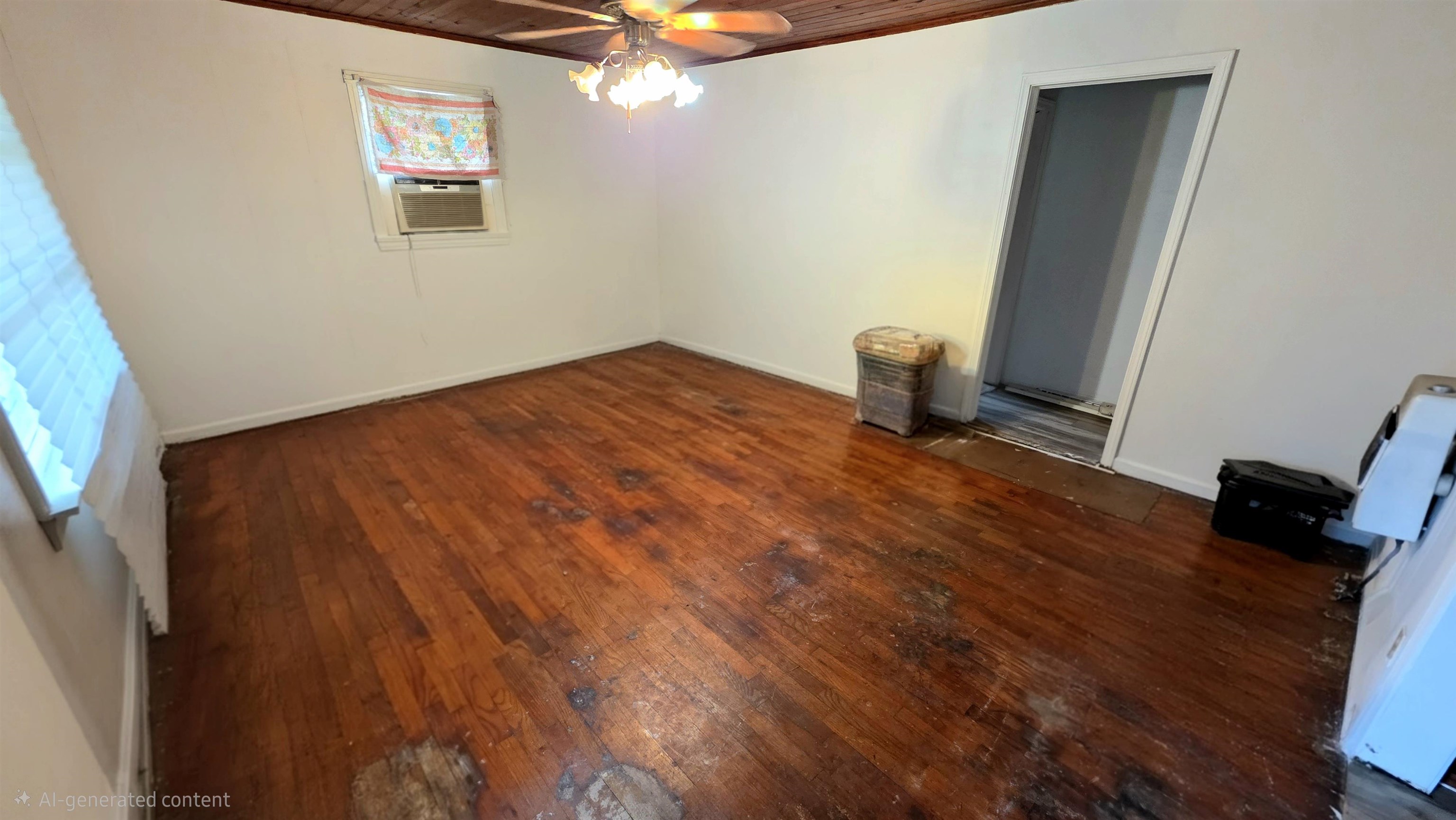 85 Baker Street Savannah, TN 38372 - Photo 4 of 5 a view of empty room with wooden floor