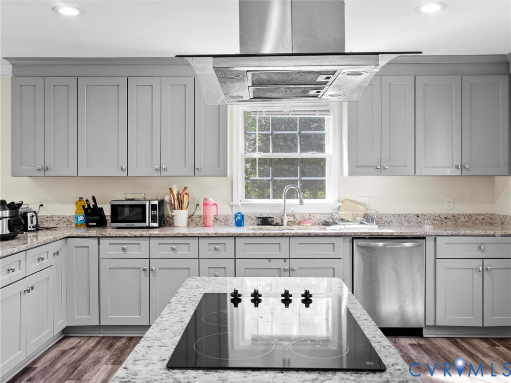 1920 Meadow Road Sandston, VA 23150 - Photo 11 of 46 a kitchen with a cabinets and window