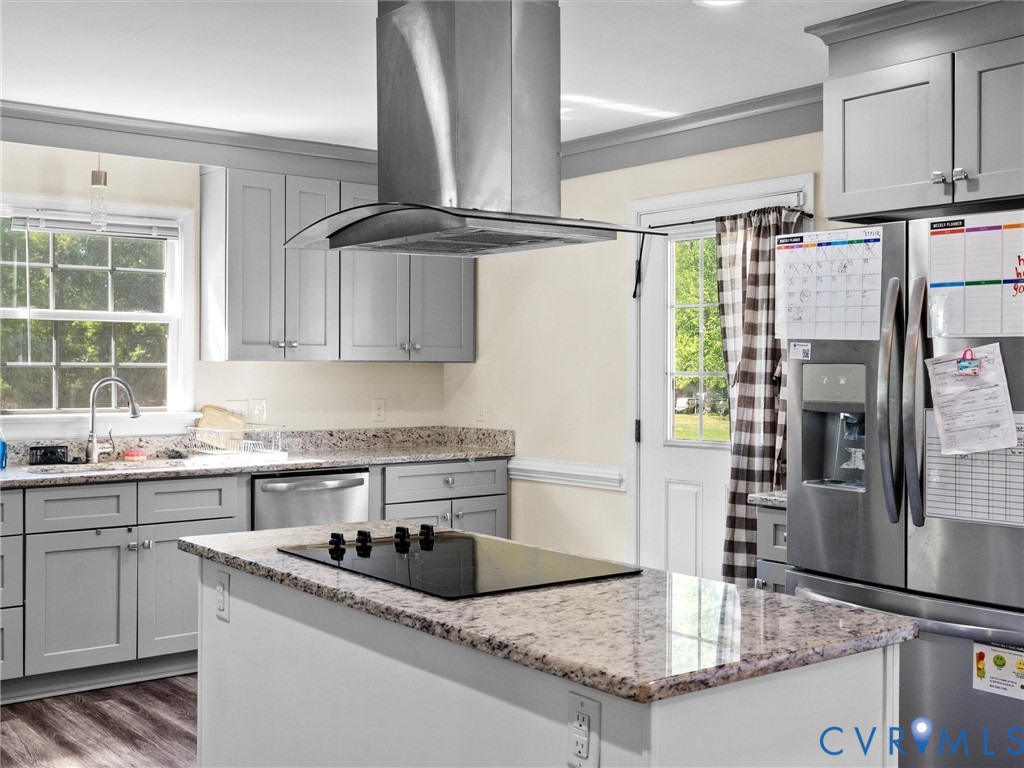 1920 Meadow Road Sandston, VA 23150 - Photo 13 of 46 a kitchen with stainless steel appliances granite countertop a sink a stove and a refrigerator