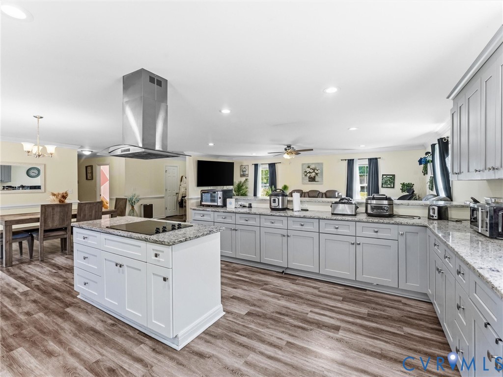 1920 Meadow Road Sandston, VA 23150 - Photo 16 of 46 a kitchen with stainless steel appliances kitchen island granite countertop a sink and cabinets