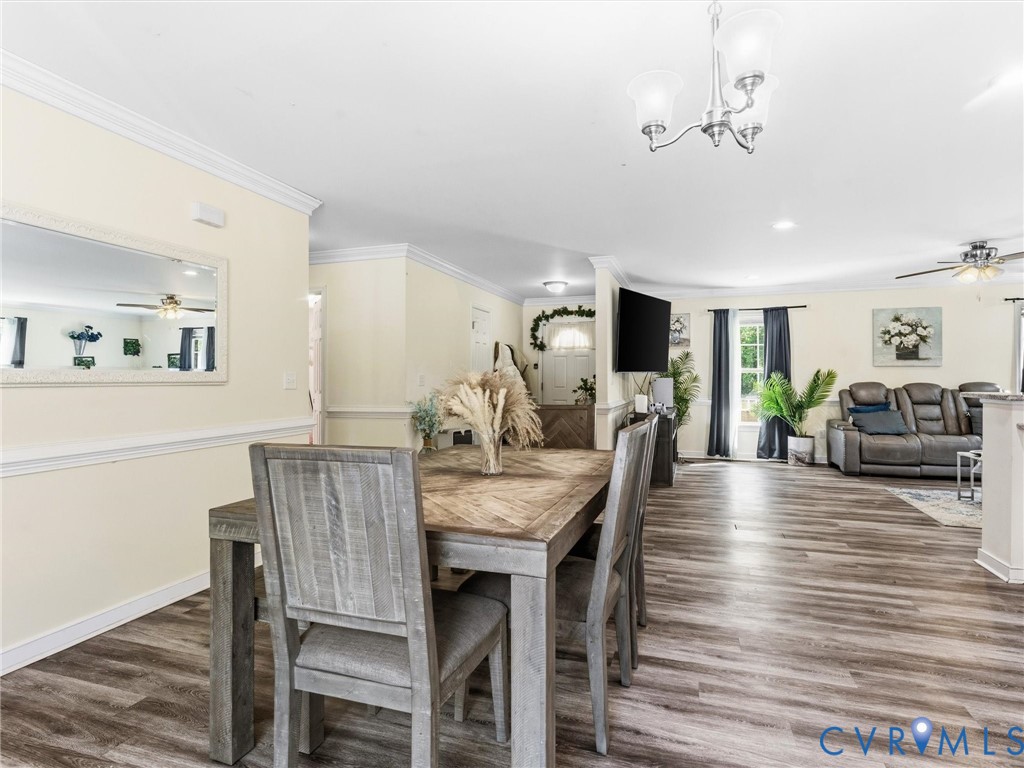 1920 Meadow Road Sandston, VA 23150 - Photo 19 of 46 a view of a dining room with furniture and wooden floor