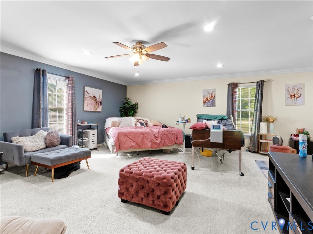 1920 Meadow Road Sandston, VA 23150 - Photo 24 of 46 a bedroom with furniture and a large window