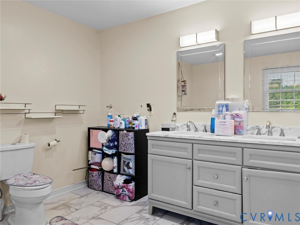 1920 Meadow Road Sandston, VA 23150 - Photo 28 of 46 a room with a sink and cabinets