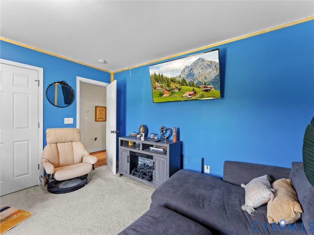 1920 Meadow Road Sandston, VA 23150 - Photo 40 of 46 a living room with furniture and a window