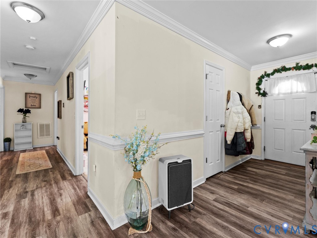 1920 Meadow Road Sandston, VA 23150 - Photo 4 of 46 a living room with furniture and a fireplace